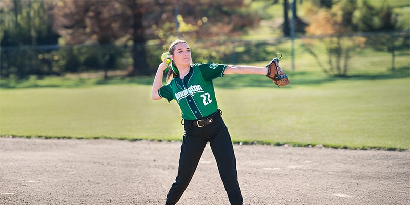 Softball player wearing Champion uniform